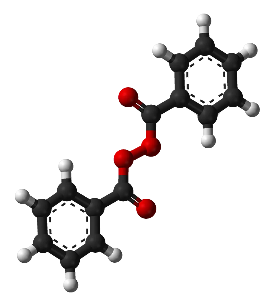 A 3D model of the benzoyl peroxide molecule showing two aromatic rings joined by a peroxide group